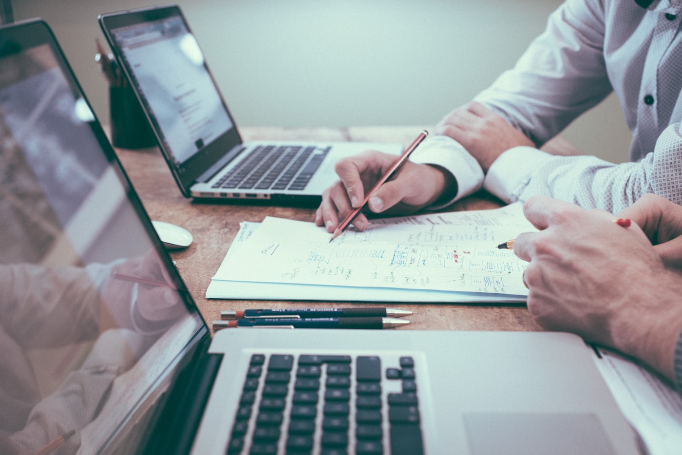 Executive reviewing a strategy document at a desk
